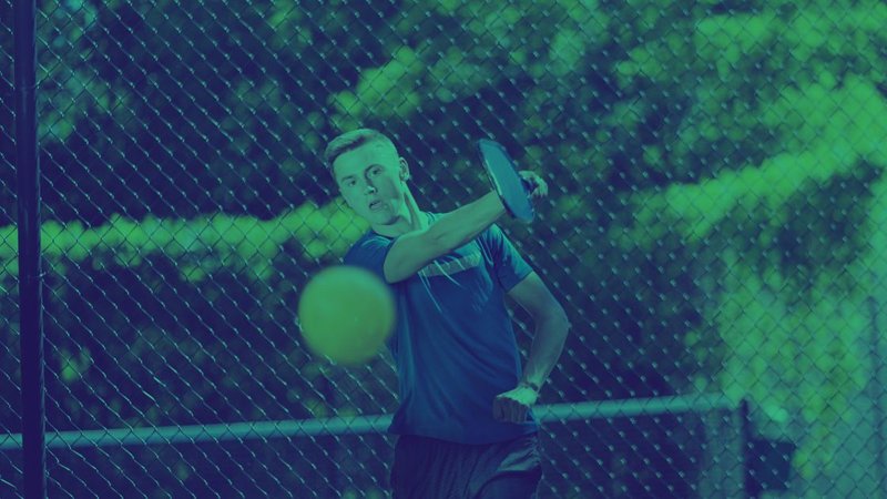 What is skinny pickleball: Player preparing to hit a drive during a game of skinny singles.