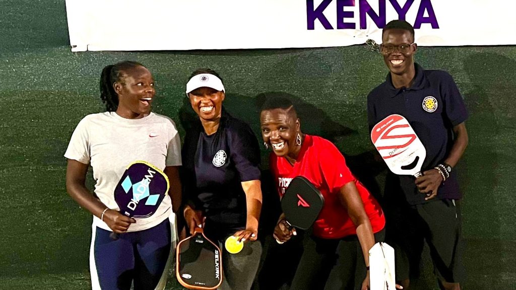 Sherry with Brian Omwando at Nairobi pickleball club in Kenya